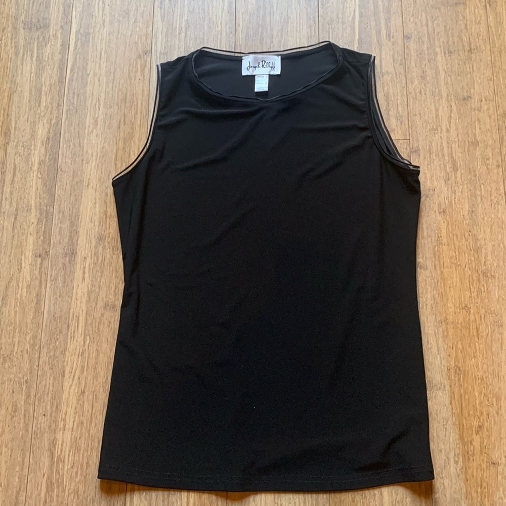 Joseph Ribkoff black size 12 top with beautiful detail on neck and sleeves.
